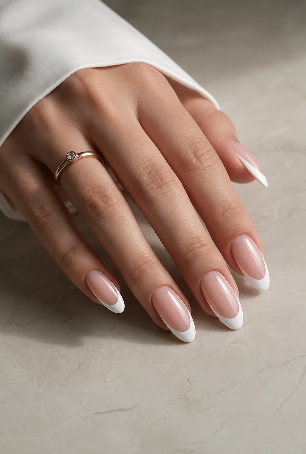 Deep smile line French manicure on almond nails