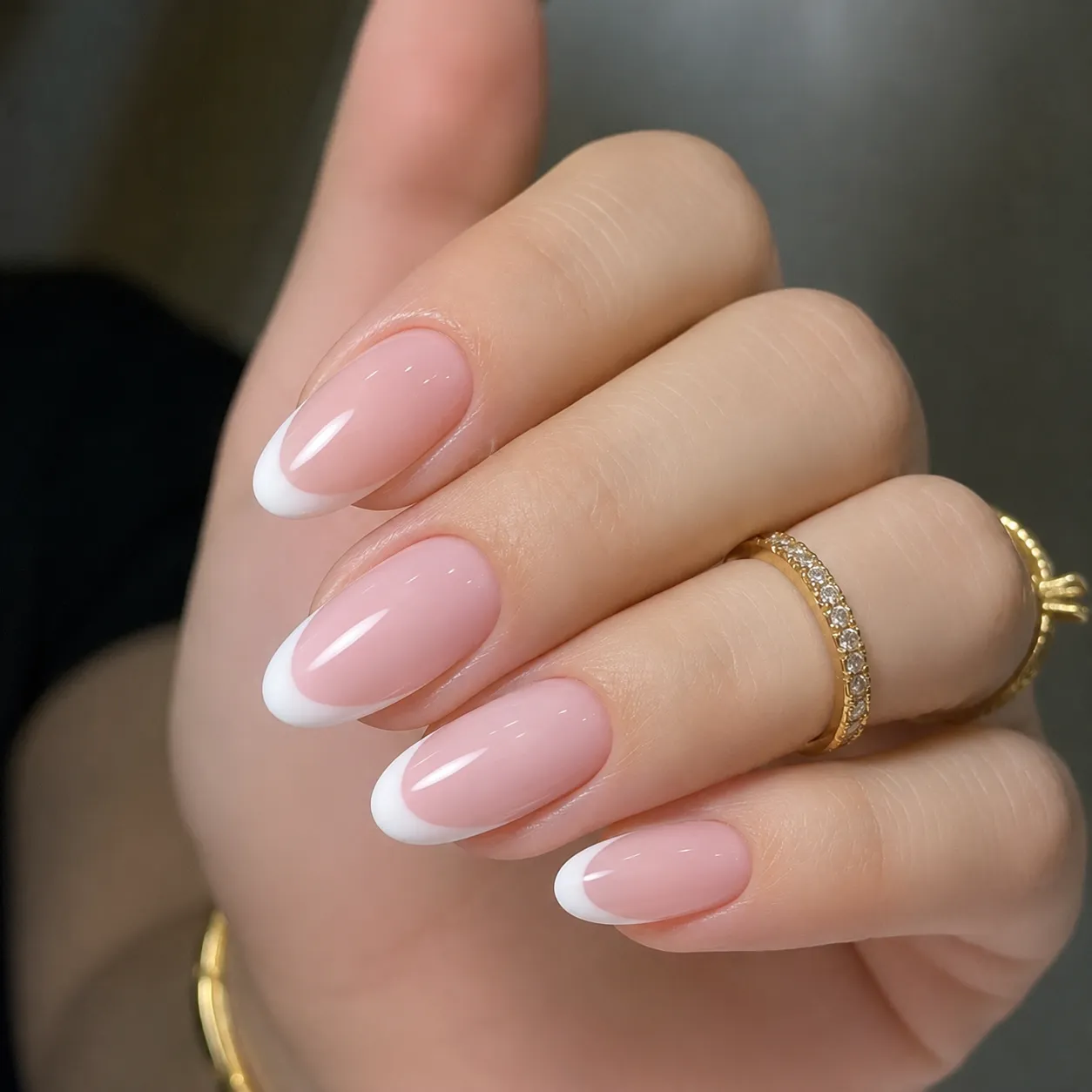 Classic French tips over a milky pink base