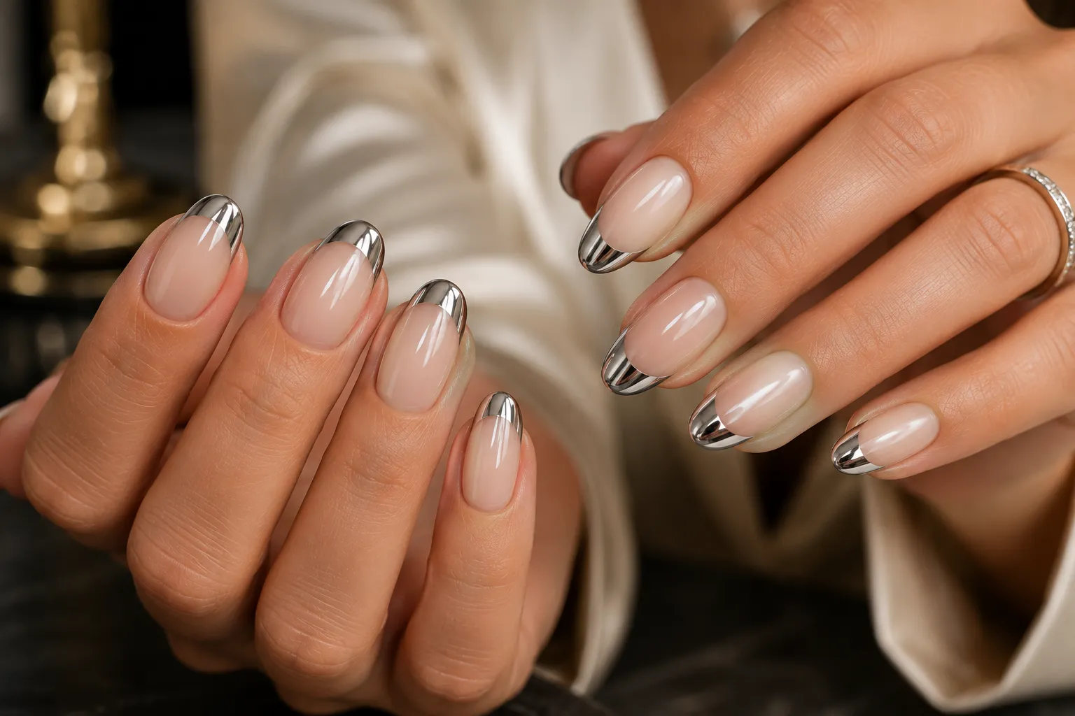 Mirror chrome French tip with a crisp reflected highlight