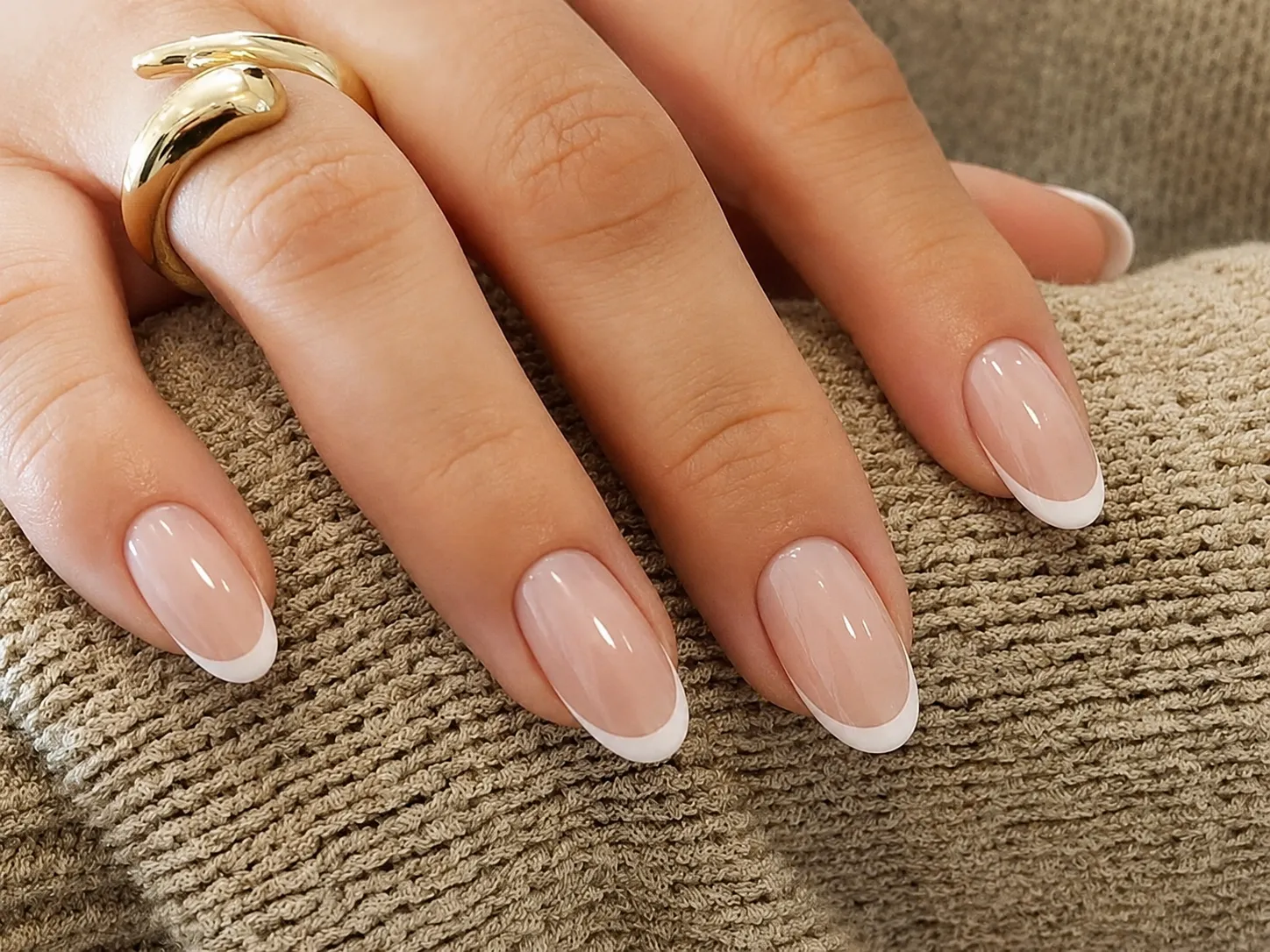 Classic French manicure on oval nails