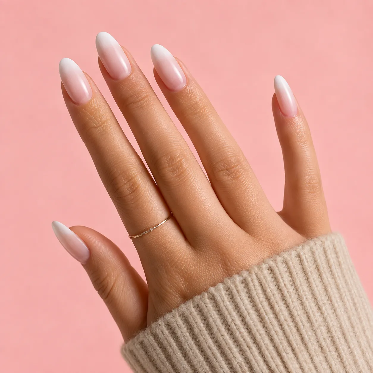 Hand-blended Baby Boomer nail showing smooth artistic pink to white transition