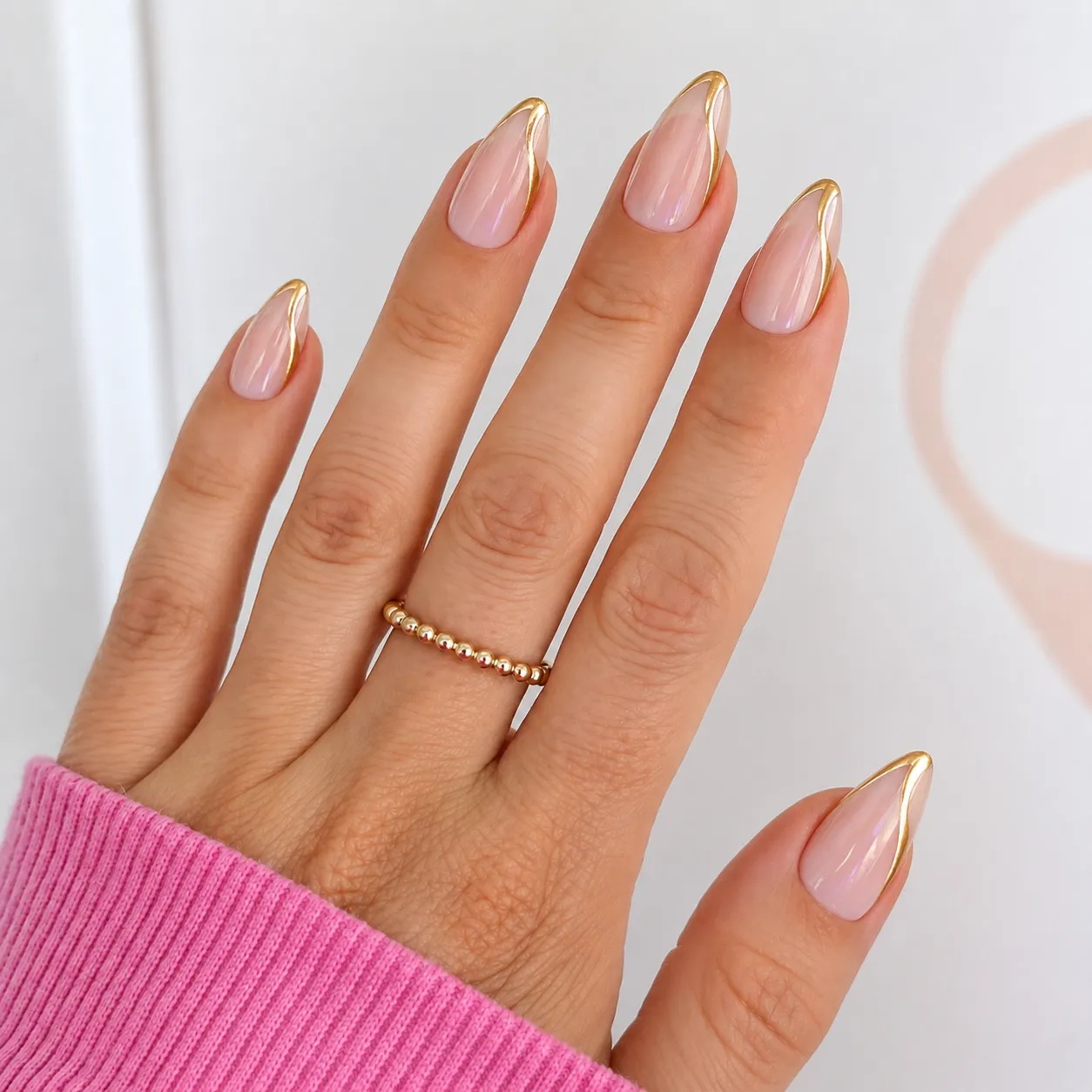 Modern side French manicure with diagonal side tips.