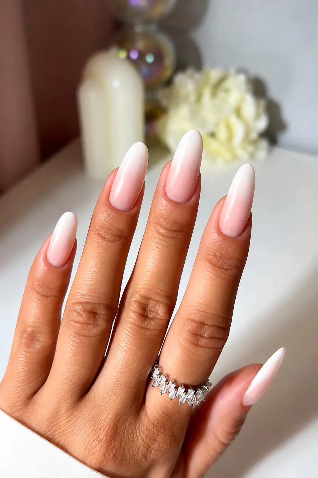 Medium almond Baby Boomer nails with a seamless pink to white fade