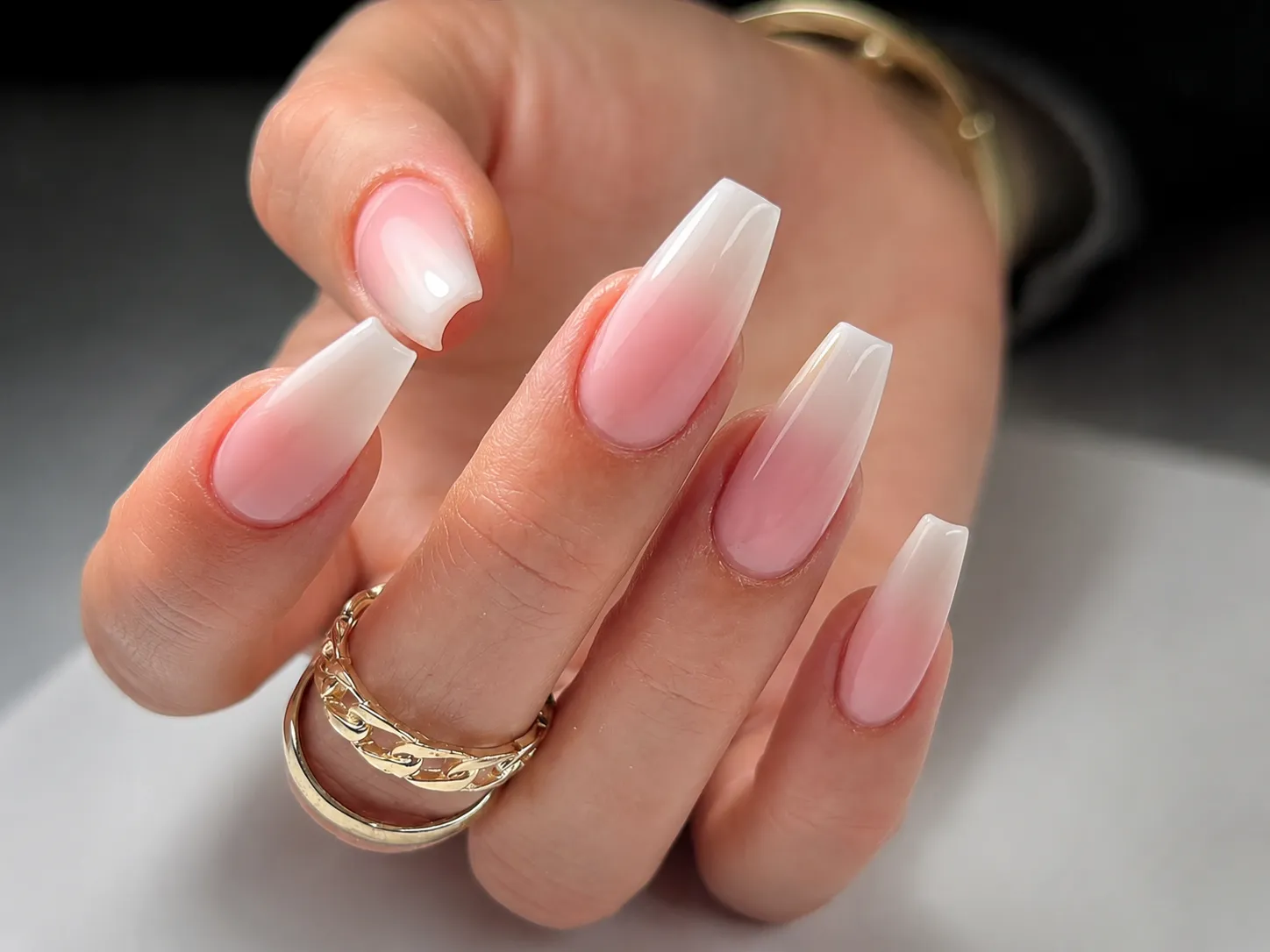 Baby Boomer ombré on long ballerina nails with narrow squared tip