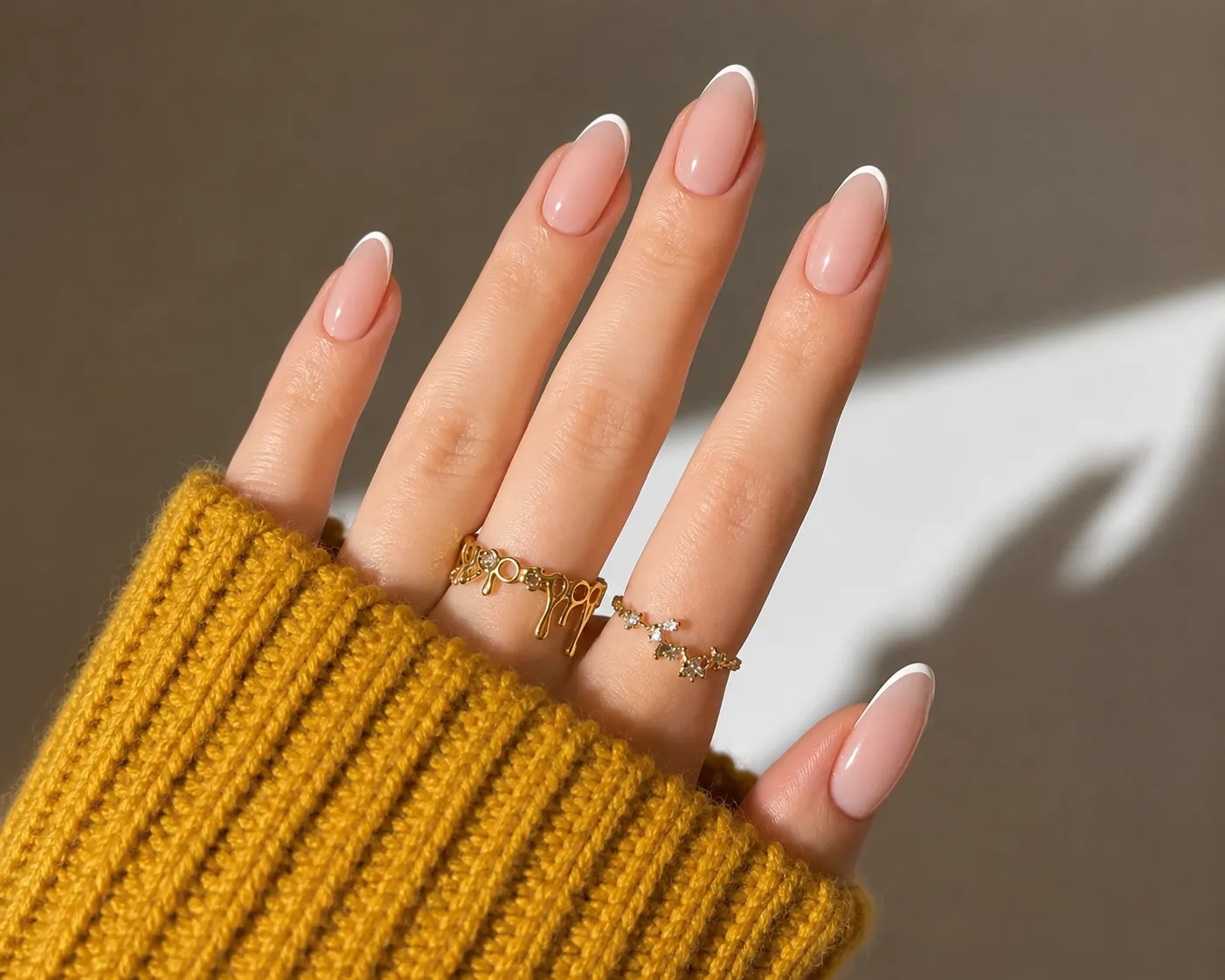 Classic white micro French tips on glossy natural nails