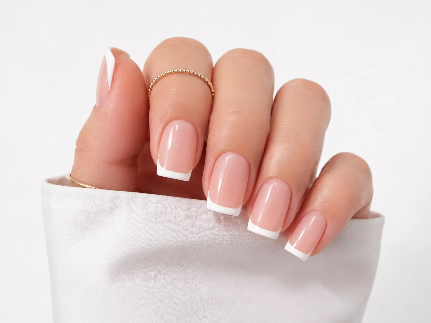 Medium true square nails with balanced classic French placement and crisp flat edges