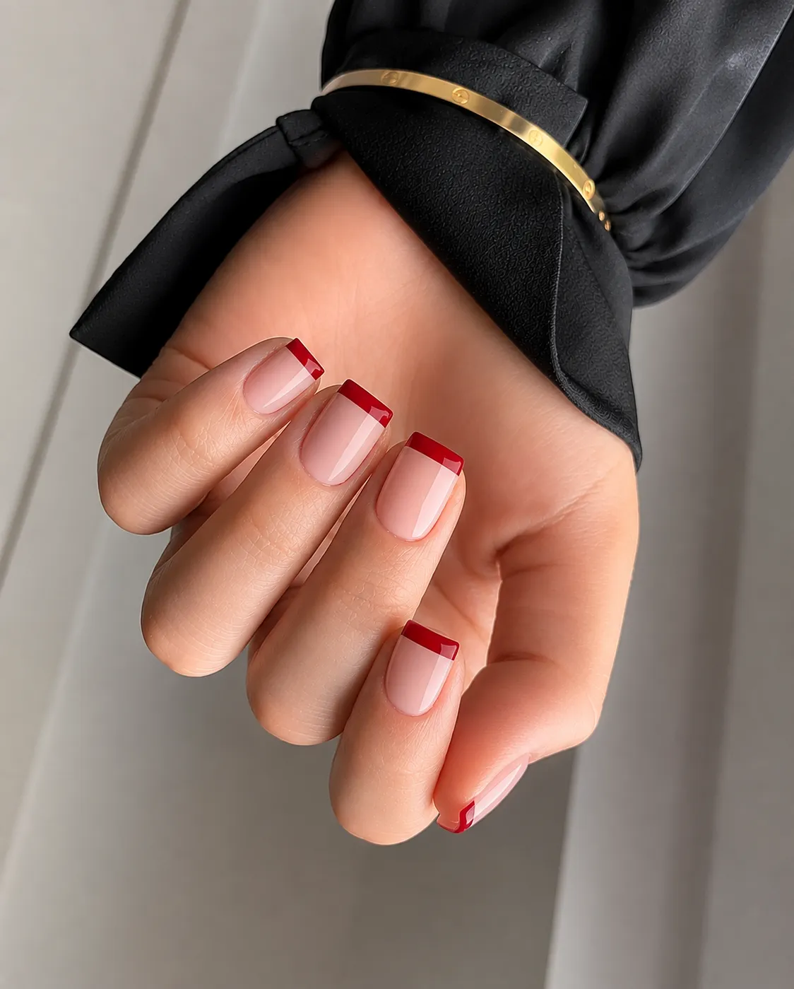 Red French tips on square nails with a crisp flat edge