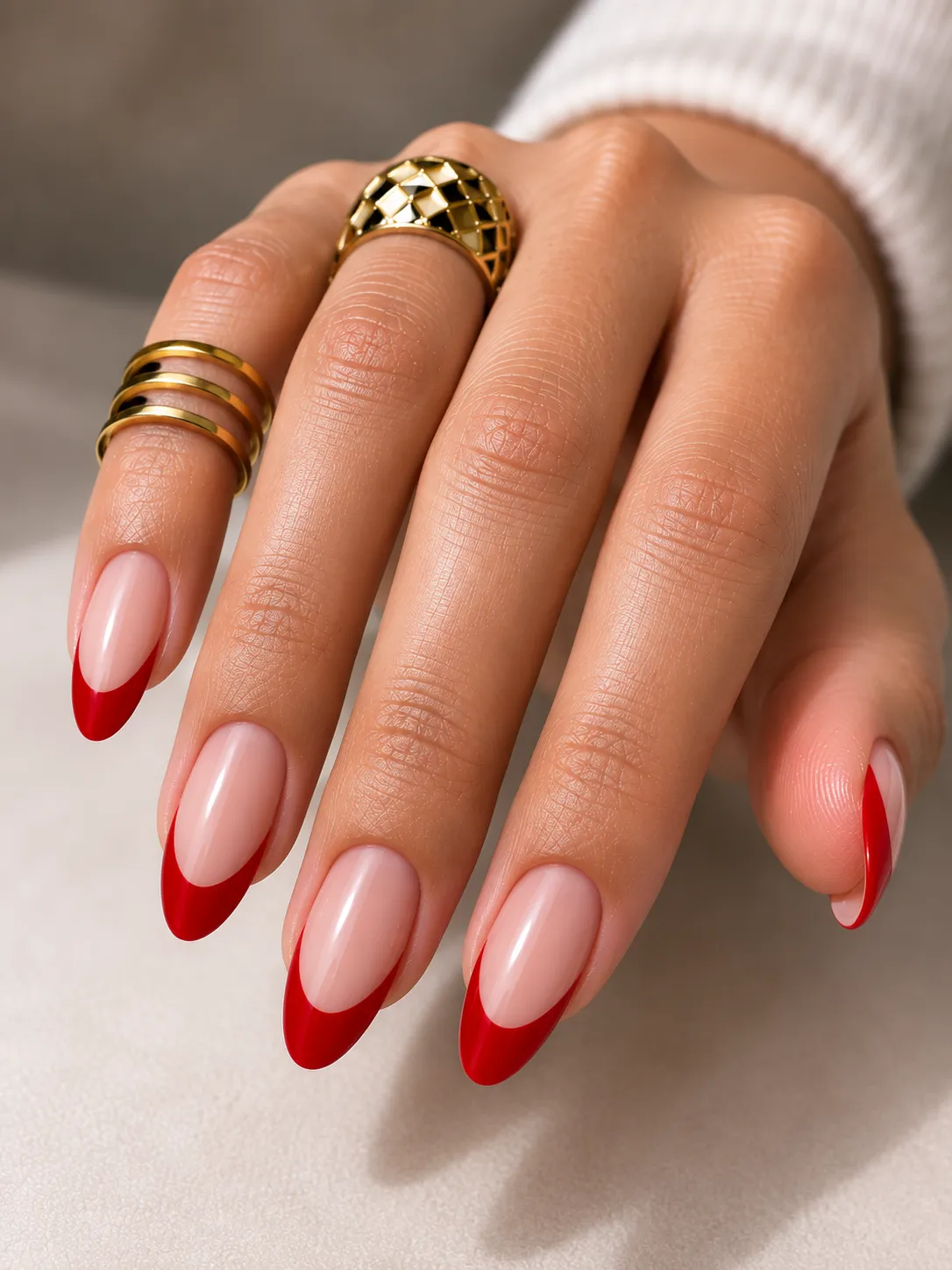 True red French tips on medium neutral skin