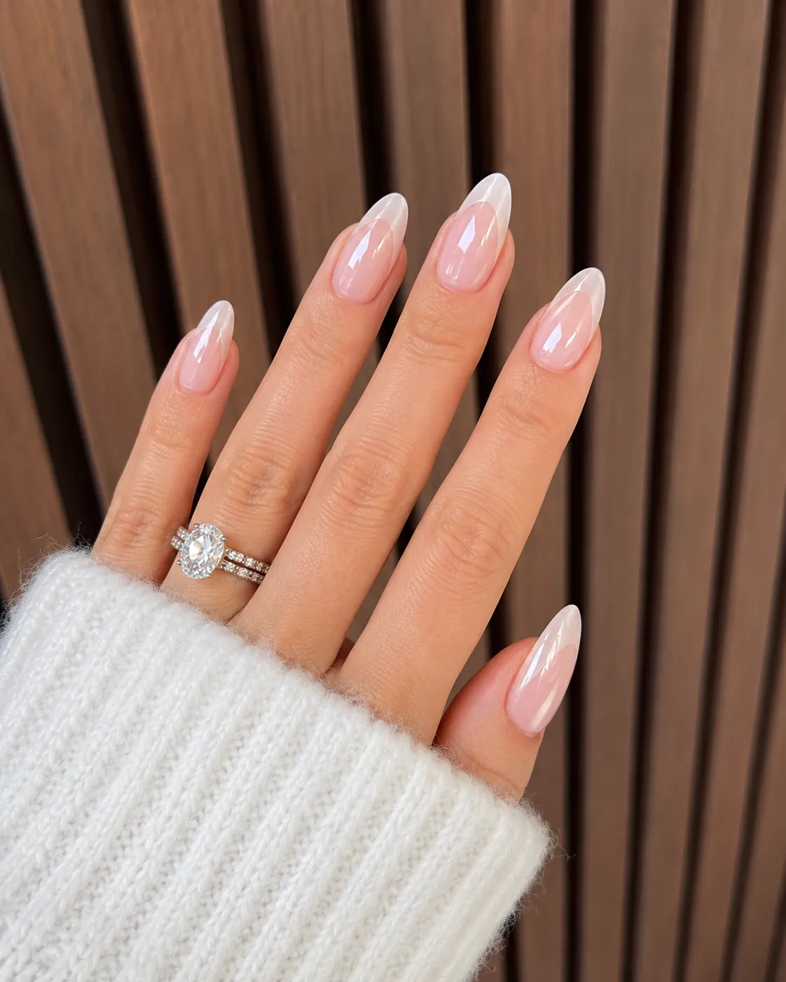 Vanilla glazed French tip nails with a warm creamy base and soft pearl finish
