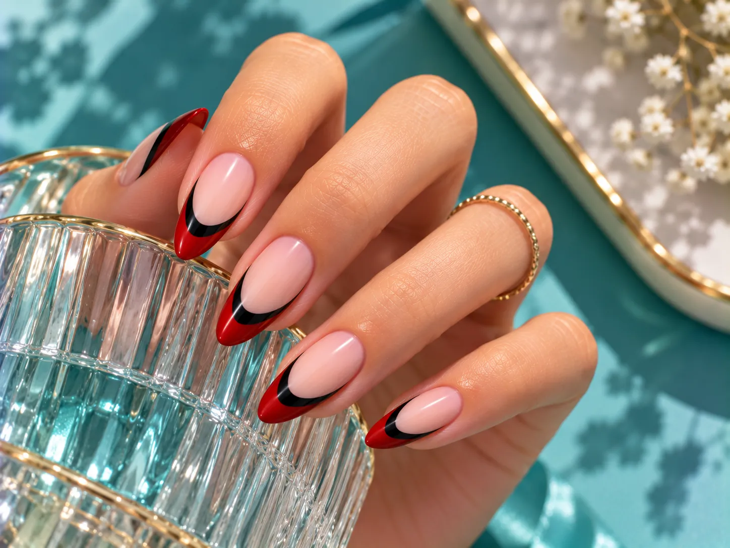 Red and black double line French tips on almond nails