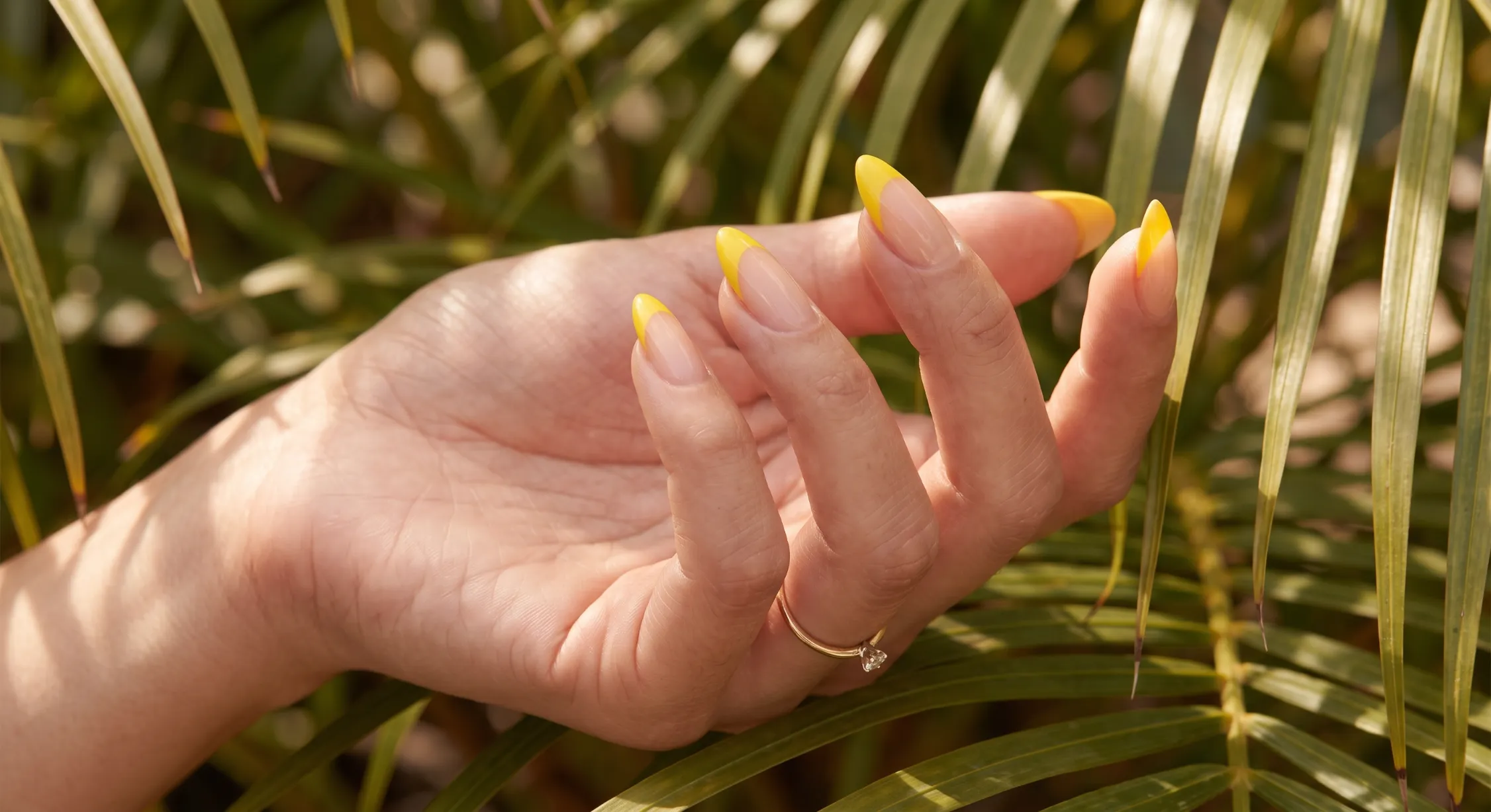 Classic butter yellow French tip nails with balanced yellow smile lines