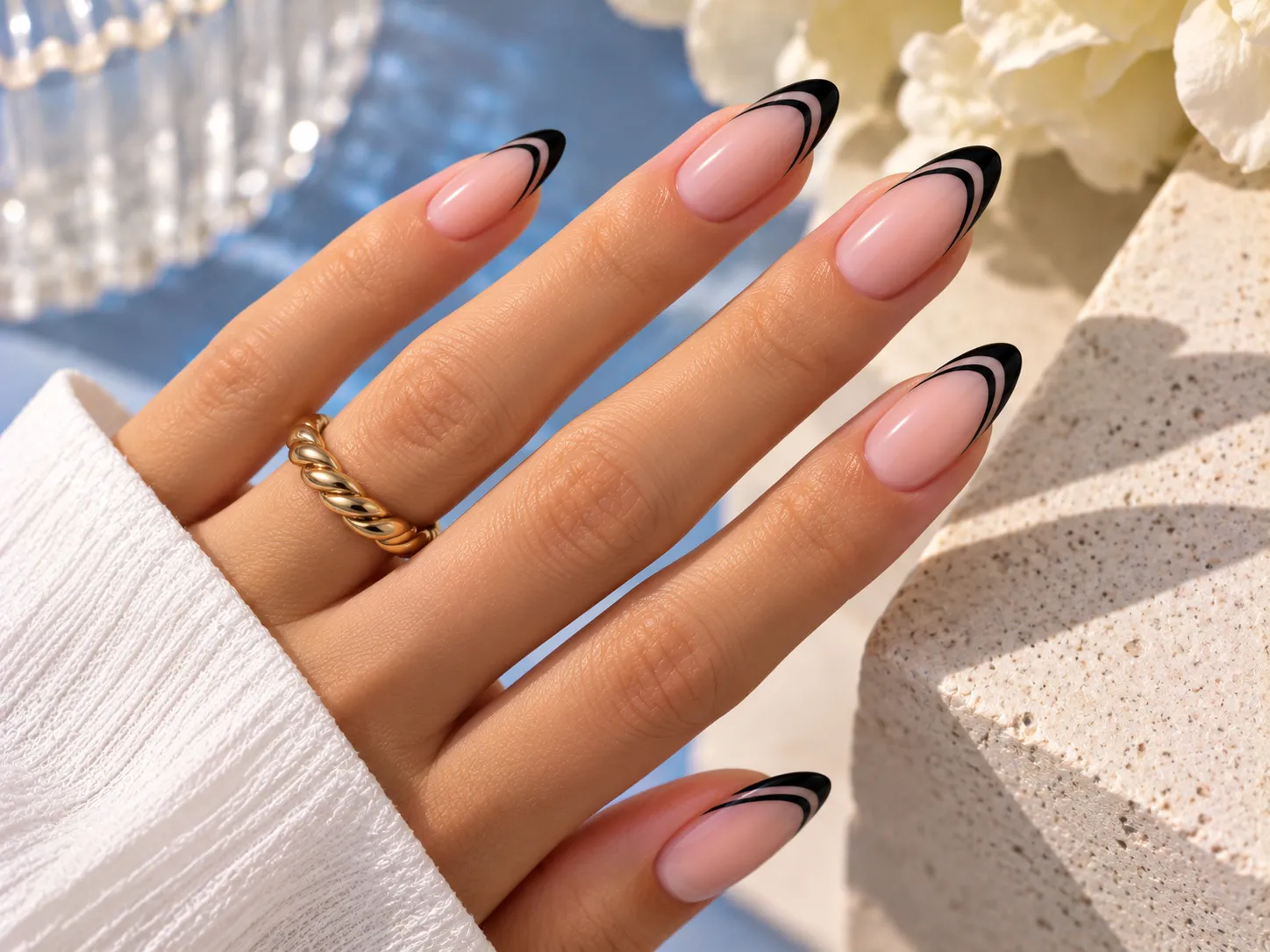 Double black French tip nails with two fine black lines