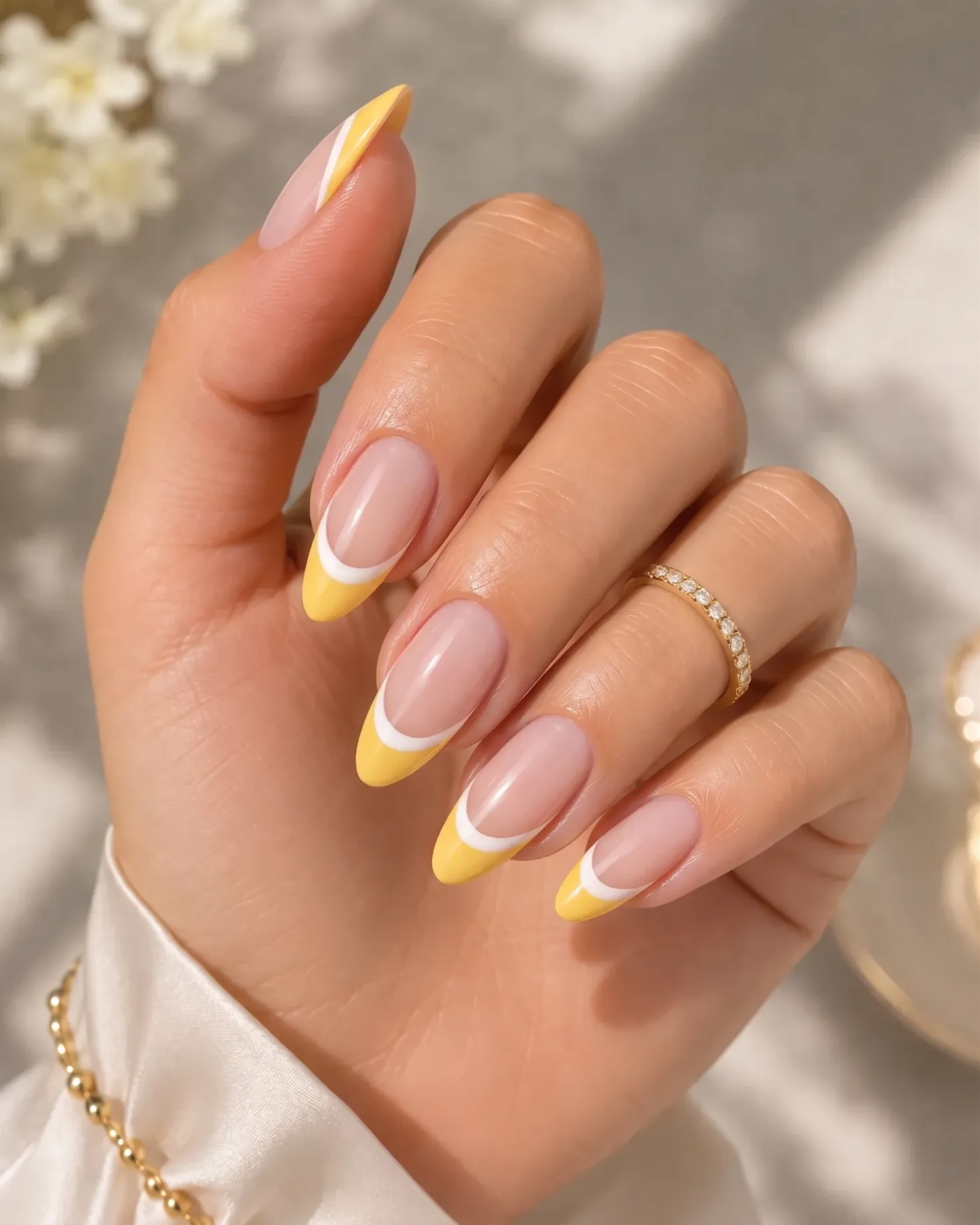 Yellow and white double French tip nails with two defined smile lines