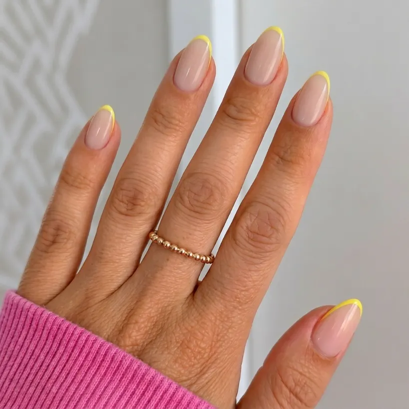 Yellow micro French tip nails with ultra-thin yellow smile lines